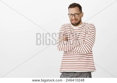 Brokenhearted Miserable Adult Boyfriend In Glasses, Crossing Hands On Chest And Crying, Being Offend