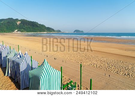 Zarauz City Beach With Yellow Sand And Blue Sea Water, Pais Vasco, Spain