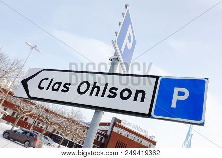 Insjon, Sweden - Fabruary 9, 2018: Signpost At The Retail Hardware Clas Ohlson Shop At Hjultorget Sq