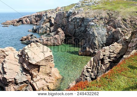 View Of The Rocky Coastline Along The Unknown Soldier Trail In White Point, Cape Breton.