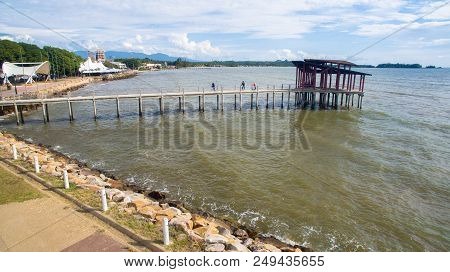 Sipitang,sabah-july 6,2018:aerial View Of The Wooden Pier Or Jetty With Hut At Esplanade In Sipitang