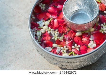Songkran Festival With Cool Fresh Water Have A Jasmine Flower And Rose Flower And Aromatherapy In Wa