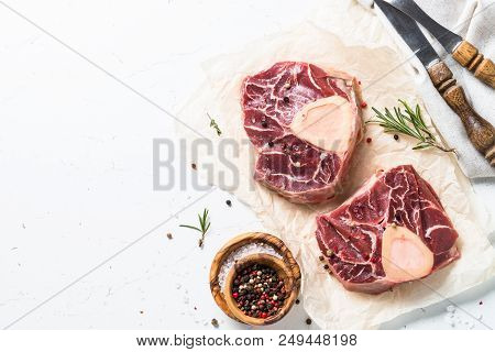Raw Beef Steak Osso Bucco. Marble Meat. Top View With Copy Space On White Table.