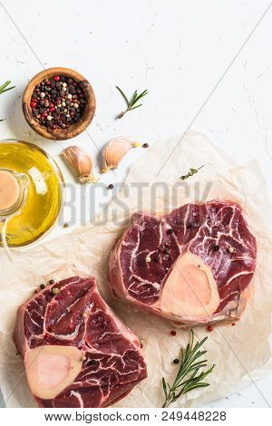 Raw Beef Steak Osso Bucco. Marble Meat. Top View With Copy Space On White Table.