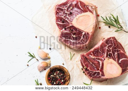 Raw Beef Steak Osso Bucco. Marble Meat. Top View With Copy Space On White Table.