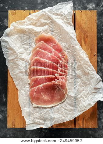 Butchers Made Free Range Raw Lean Unsmoked Bacon Pork Medallions And Hen Eggs On Wooden Box.