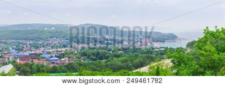 Panorama Of A Small Village By The Sea Near The Mountain