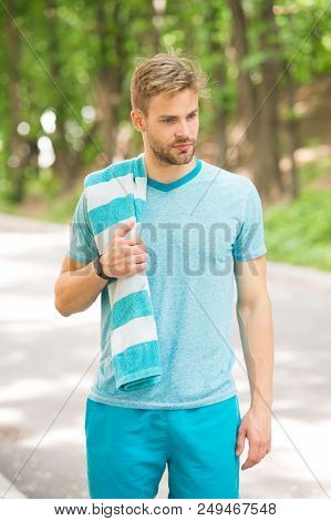 Tired Man. Tired Man With Towel Relax After Training In Forest. Man Tired After Running In Park. Man