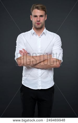 I Am Here To Help You. Man Shop Consultant Looks Confident And Hospitable. Man Calm Face Posing Conf