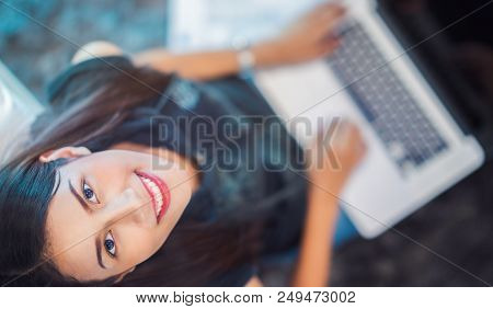 University Student Sit And Do Home Work In Computer Notebook On The Floor In Bed Room, This Immage C