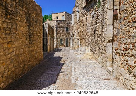 Street In Girona, Catalonia, Spain. Scenic And Colorful Ancient Town. Famous Tourist Resort Destinat