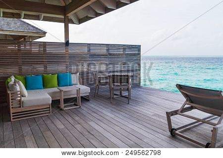 Beautiful Tropical Maldives Island Summer Vacation Relaxing At Overwater Villa In Luxury Resport.