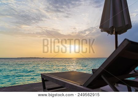 Beautiful Tropical Maldives Island Summer Vacation Relaxing At Overwater Villa In Luxury Resport.