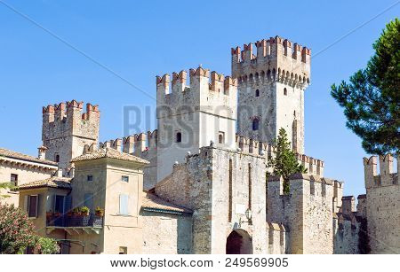 Sirmione, Italy - August 10, 2008: Garda Lake, The Rocca Scaligera Castle (xiii Century)