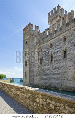 Sirmione, Italy - August 10, 2008: Garda Lake, The Rocca Scaligera Castle (xiii Century)