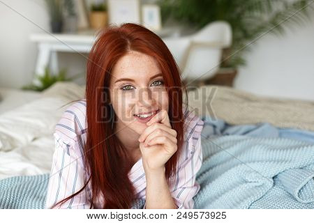 People, Lifestyle, Beauty, Rest, Leisure And Relaxation Concept. Attractive Freckled Red Haired Youn