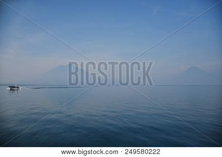 Lake Atitlan, Guatemala, 25.05.2018 :lake Atitlan In Early Morning Haze With San Pedro Volcano And A