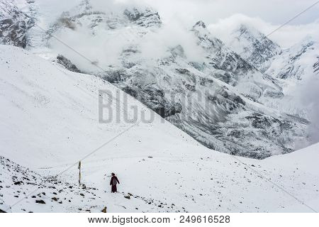 A Lone Monk On The Thorong La Pass, Nepal.
