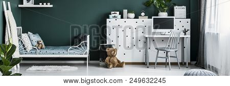 Dark Green Teenager Room Interior With Metal Bed, Mockup Computer On Desk And Fresh Plants, Books An