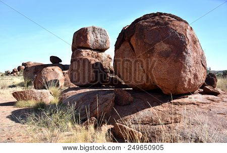 Massive Boulders Formed By Erosion In The Karlu Karlu, Devils Marbles Area Of The Outback (northern 