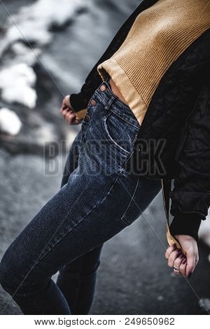 Knee Figure Of Young Beautiful Blonde Straight Hair Woman In The City, One Hand In Pocket - Eyes Clo
