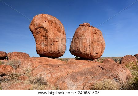 Massive Boulders Formed By Erosion In The Karlu Karlu, Devils Marbles Area Of The Outback (northern 