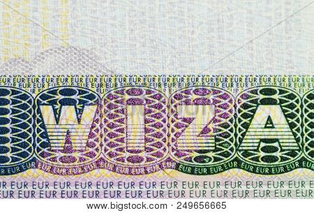 Close Up Of Visa In Passport. Poland Of Shengen Travel Concept.