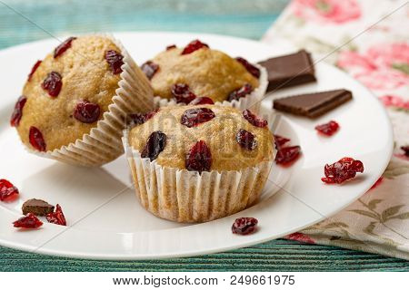 Homemade Cupcakes With Cherries Are Located On A Light Background. A Few Cupcakes Are Located On A W