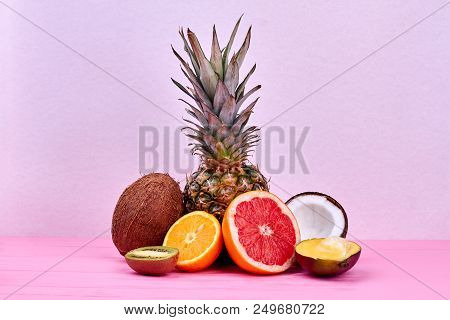 Composition From Healthy Exotic Fruits. Mix Of Fresh Tropical Fruits On Pastel Background. Summer Fr