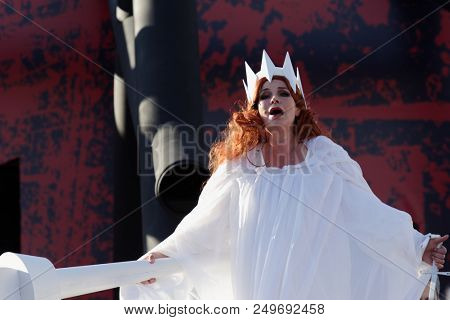 ST. PETERSBURG, RUSSIA - JULY 15, 2018: Julia Gertseva as Lady Macbeth in the opera Macbeth outdoors during the festival All Together Opera. It was 2nd of 4 performances