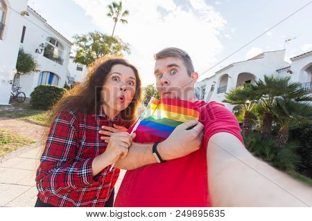 Young Man And Woman Surprised When The First Time Came Gay Parade.