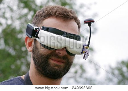 Young man wearing FVP goggles. Headshot
