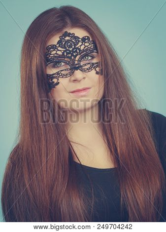 Pretty Mysterious Woman Wearing Black Eye Lace Mask Having Long Brown Hair.