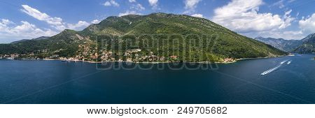 Aerial Panoramic Beautiful View From Above To Kotor Bay And Regular Passenger Ferry From Lepetane To