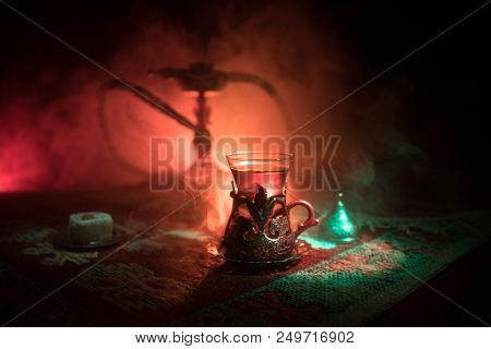 Hookah Hot Coals On Shisha Bowl Making Clouds Of Steam At Arabian Interior. Oriental Ornament On The
