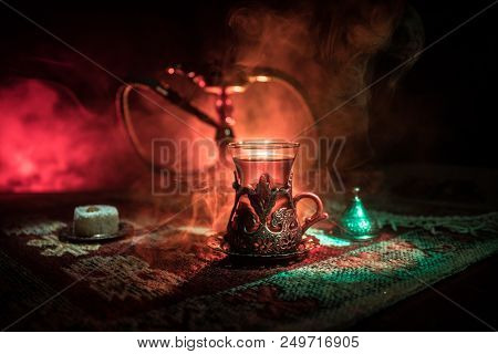 Hookah Hot Coals On Shisha Bowl Making Clouds Of Steam At Arabian Interior. Oriental Ornament On The