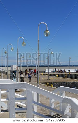 Sopot, Poland - June 6, 2018: Wooden Sopot Pier In Sunny Day. It Is The Longest Wooden Pier In Europ