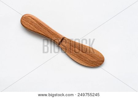 Kitchen Accessories. Wooden Knife Isolated On White Background
