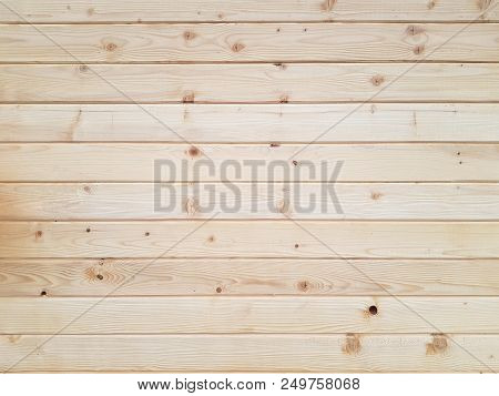 Treated Natural Wooden Pine Boards Arranged Horizontally Side By Side As Texture Background