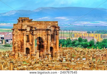 Trajan Arch Within The Ruins Of Timgad In Algeria.