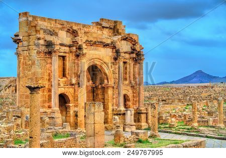 Trajan Arch Within The Ruins Of Timgad In Algeria.