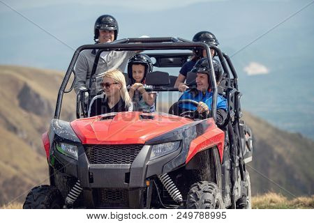 Friends Driving Off-road With Quad Bike Or Atv And Utv Vehicles.
