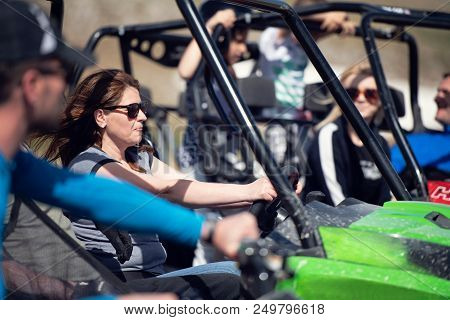 Friends Driving Off-road With Quad Bike Or Atv And Utv Vehicles.
