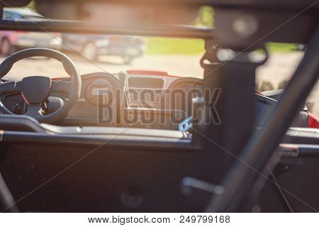 Young People On Utv Vehicles On A Countryside Trail. View From A Utv Vehicle With Man Driving An Utv