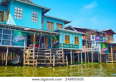 Inpawkhon, Myanmar - February 18, 2018: The Row Of Village Cafes And Stores In Stilt Buildings On In