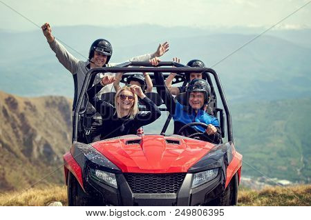 Friends Driving Off-road With Quad Bike Or Atv And Utv Vehicles.