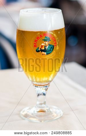 Milan, Italy - May 31, 2018: Glass Of Italian Birra Moretti Beer.