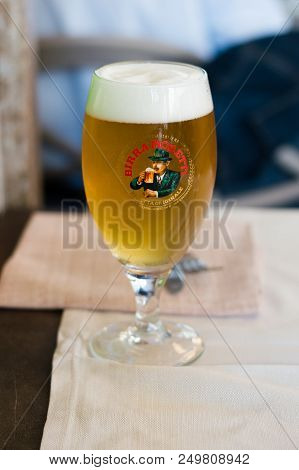Milan, Italy - May 31, 2018: Birra Moretti Beer In Glass. Brand Belong To Heineken.
