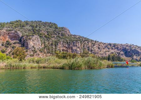 Lycian Tombs In The Mountains On The Dalyan River, Turkey. Dalyan Canal View. Dalyan Is Populer Tour