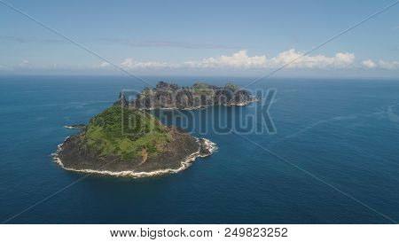 Small Rocky Islands In The Sea, Blue Sky And Clouds. Dos Hermanas, Palau, Santa Ana. Aerial View Of 